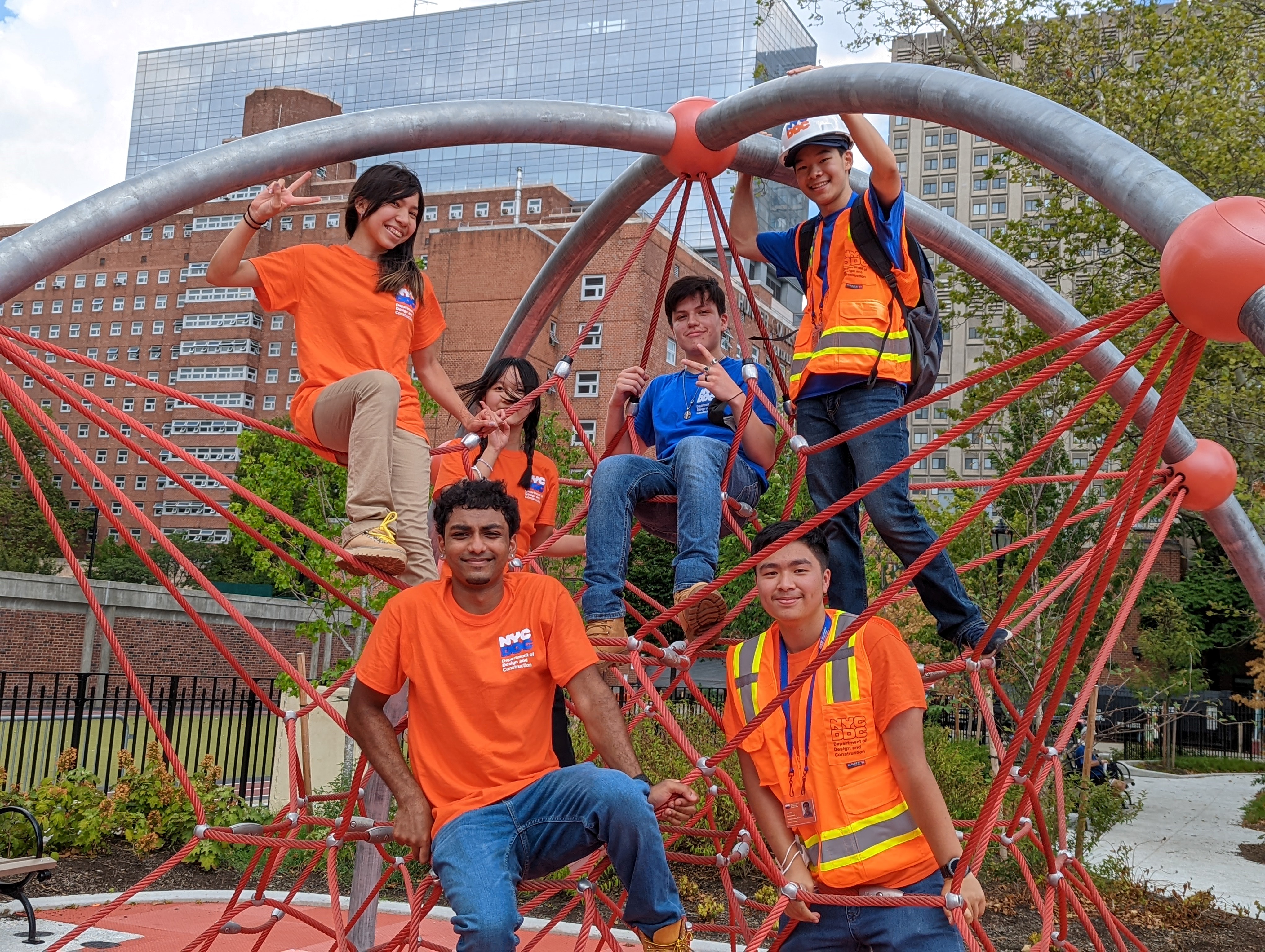 DDC interns pose at the jungle gym at Asser Levy Playground