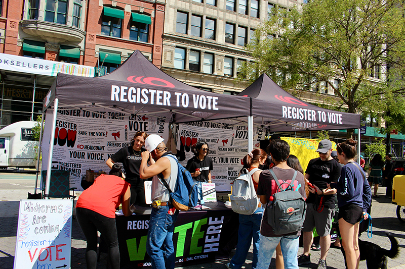 Group of people registering to vote with Headcount