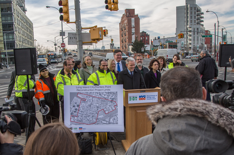 City officials gather in Long Island City to announce reconstruction project.