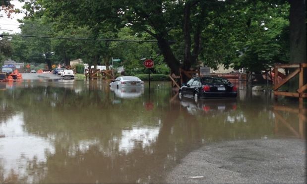 cars submergered on Staten Island after a rain event