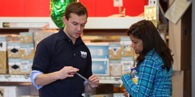 Department of Environmental Protection employee helping a customer