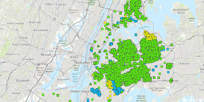 A map of NYC with colorful dots that indicate green infrastructure