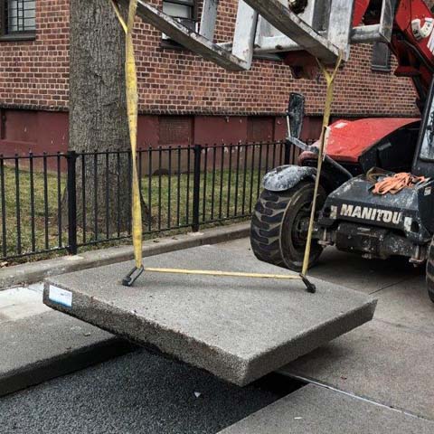 A slab of porous pavement being installed