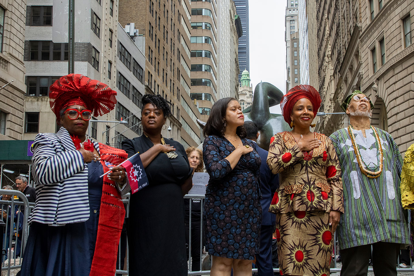 (From Left to Right) Cheryl DB Murphy, National Juneteenth Observance Foundation,
Commissioner Sideya Sherman, NYC Mayor's Office of Equity, Tiffany Raspberry Director of Intergovernmental and External Affairs, Commissioner Laurie Cumbo, NYC Department of Consumer Affairs, and Chief Baba Neil Clarke stand for the National Anthem.