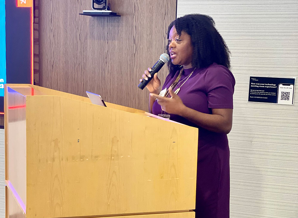 NYC Mayor's Office of Equity Commissioner Sideya Sherman delivering remarks on what New York City's government is doing to promote racial equity in its decision making at the Robin Hood Deep Dive event.  