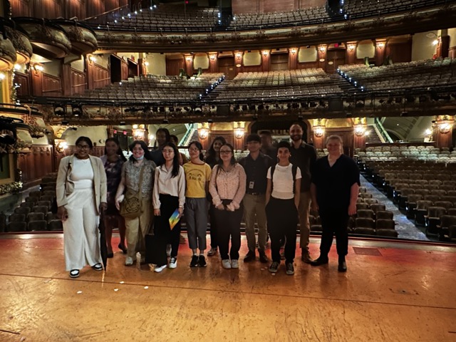 SYEP Pride participants pose on stage at the New Amsterdam Theatre in NYC. 