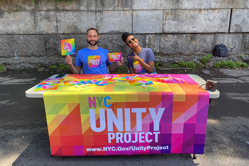 Dabash Negash and Ronald Porcelli tabling at Harlem Pride.