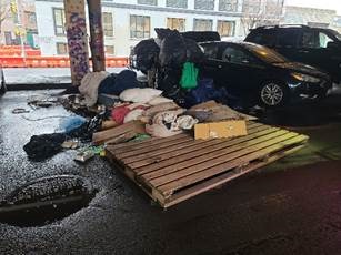 Encampment on Meeker Avenue in Brooklyn with garbage visible (before clean up)