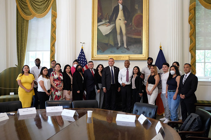 Photo of Mayor Adams and a group of DREAMers at City Hall