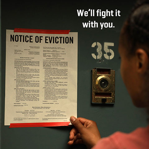 Photo of a Notice of Eviction on a door with the words We'll fight it with you.