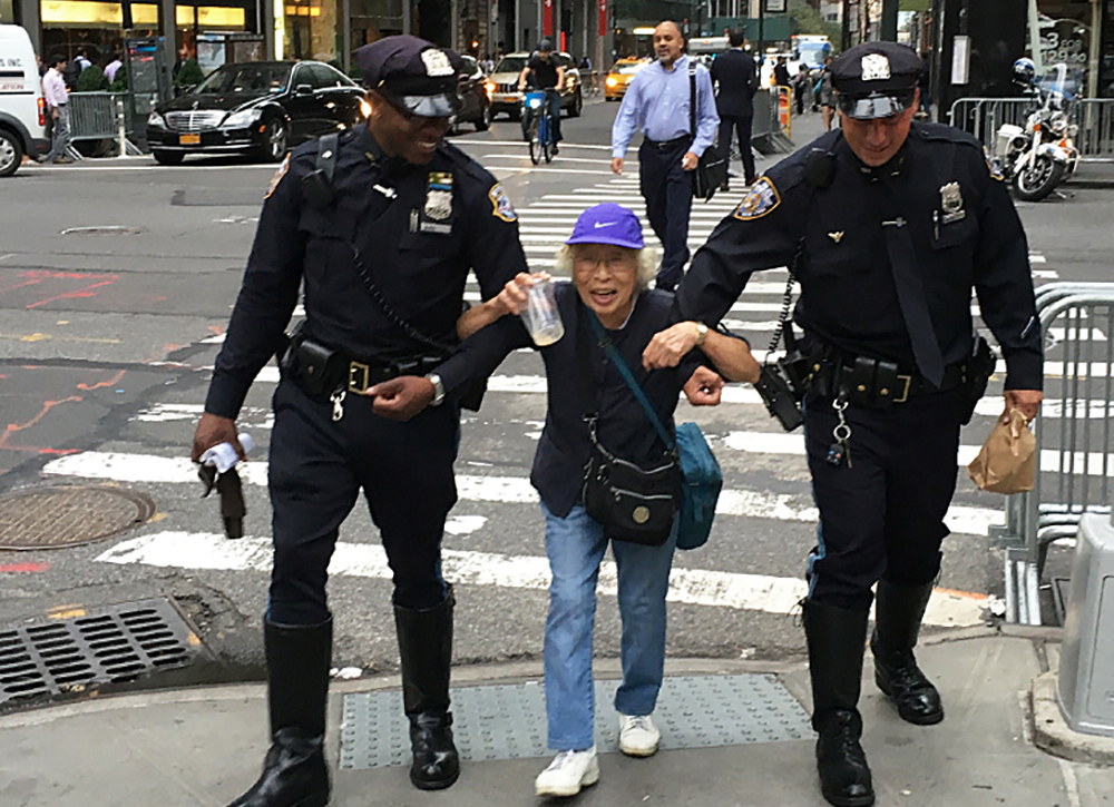 NYPD Highway District officers lend a hand.