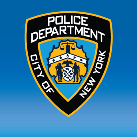 NYPD shield against blue background