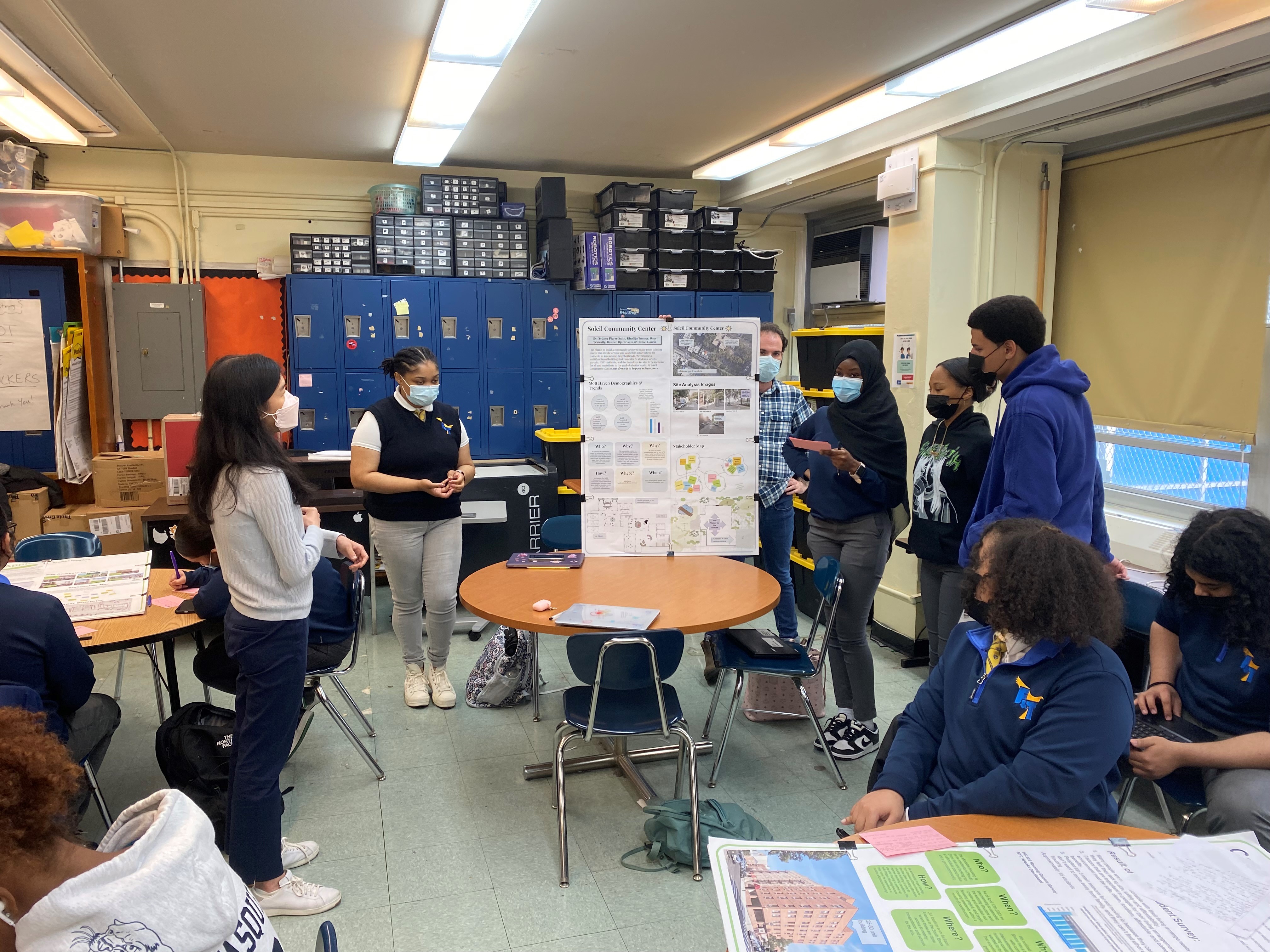 A group of students give a presentation in a Bronx high school.