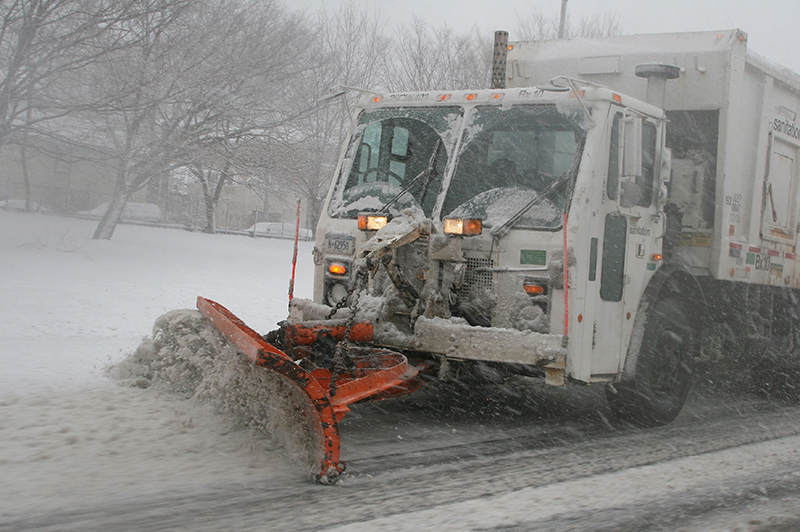 A photo of a plow clearing snow.
                                           