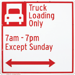Two street signs. One is white with red text and a large #3. Text reads 3 hour metered parking Commercial Vehicles Only 10am-4pm Except Sunday followed by an arrow pointing in both directions. Second Street sign is white with red text and an icon of a truck in the upper left. Text reads Truck Loading Only 7am-7pm Except Sunday followed by an arrow pointing in both directions.