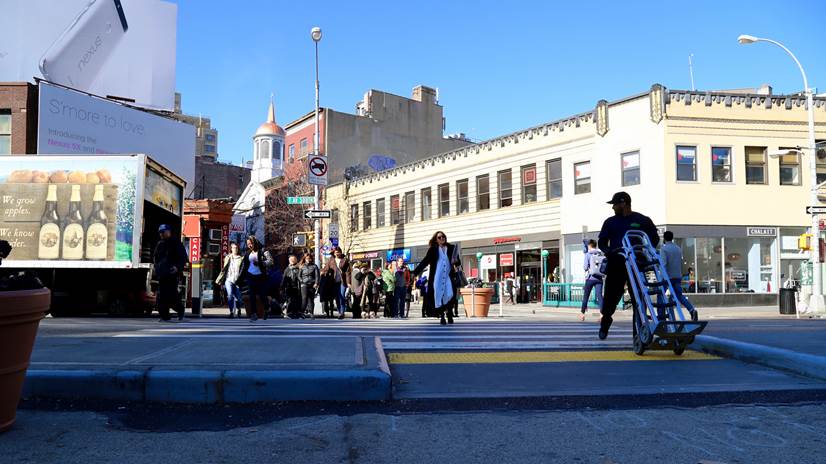 7th Avenue South and Christopher Street showing pedestrians and crosswalk