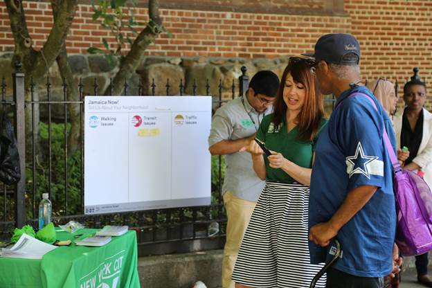 NYC DOT Street Ambassadors team conducts a survey