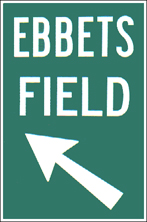 Ebbets Field directional sign. Green background and white lettering.